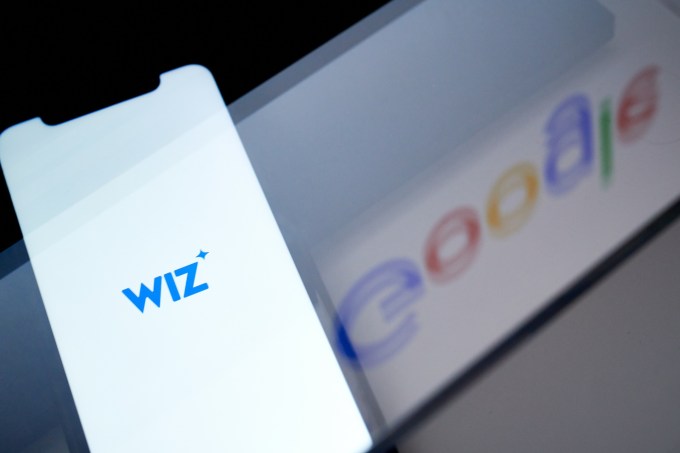 The Wiz logo on a smartphone