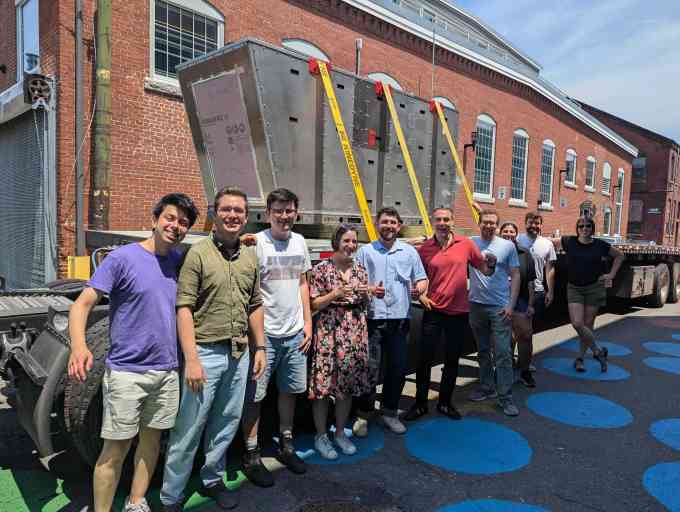 Transaera's team alongside their DOAS unit.