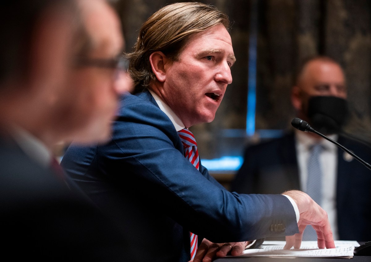 a file photo of former Cybersecurity and Infrastructure Security Agency Director Chris Krebs testifies before a Senate Homeland Security and Governmental Affairs hearing to examine claims of voter irregularities in the 2020 election in the Dirksen Senate Office Building on December 16, 2020 in Washington, DC.
