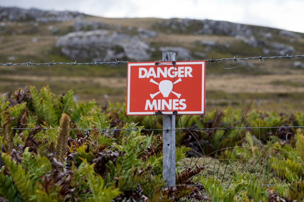 A sign warns people of landmines.