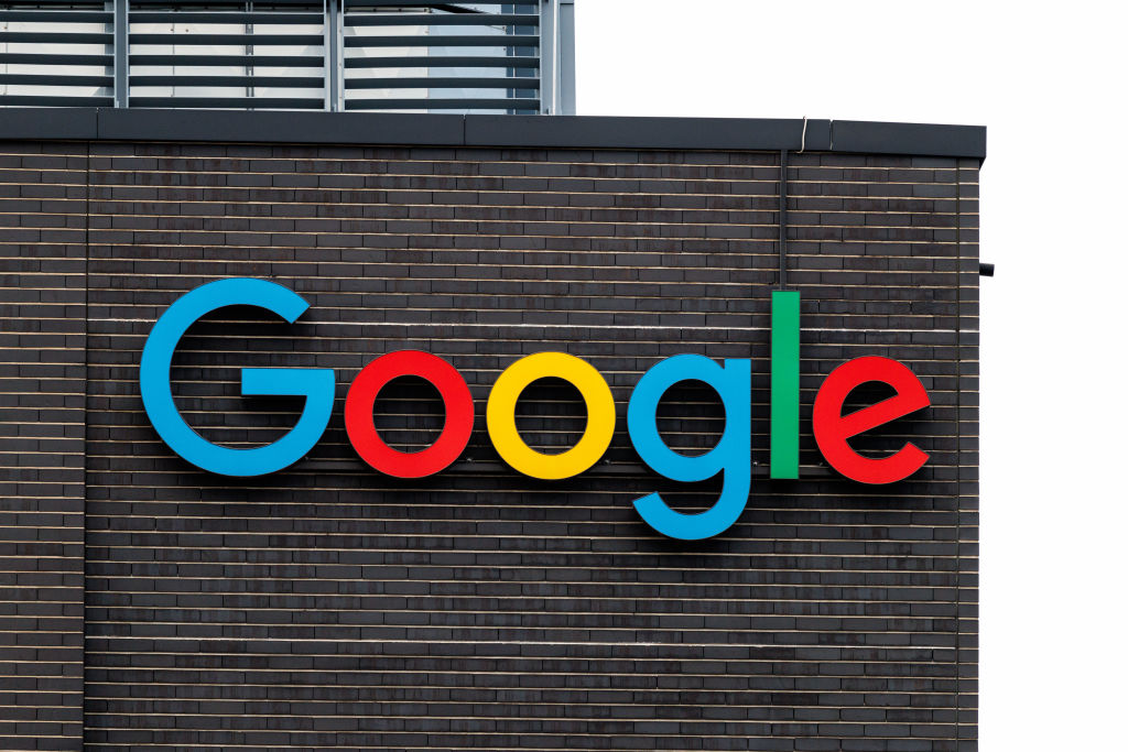 31 January 2025, Bavaria, Munich: The Google logo and lettering can be seen on the facade of the company