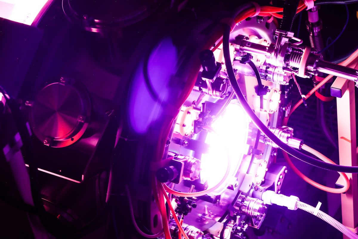 A fusion reactor glows purple.