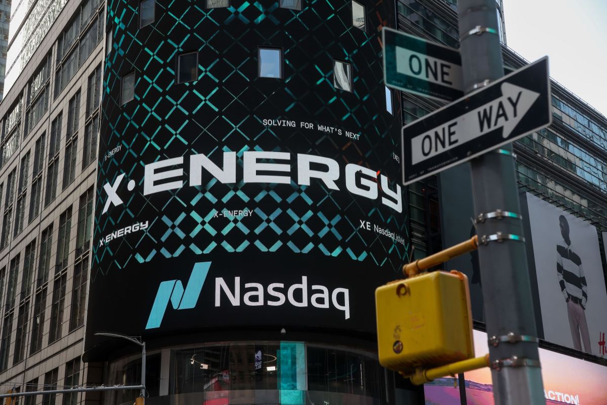 X-energy appears on a sign above the Nasdaq.